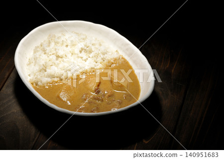 Barley rice and Massaman curry photographed separately. Barley rice and Massaman curry photographed separately. 140951683