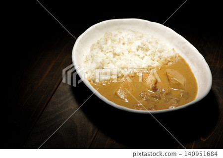 Barley rice and Massaman curry photographed separately. Barley rice and Massaman curry photographed separately. 140951684