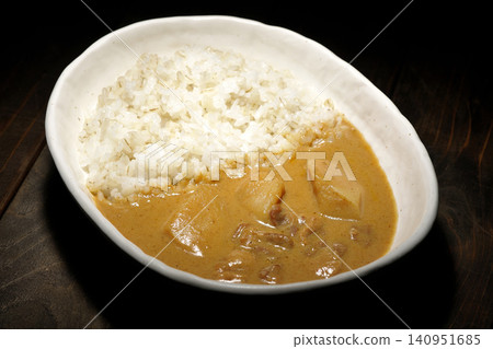 Barley rice and Massaman curry photographed separately. Barley rice and Massaman curry photographed separately. 140951685