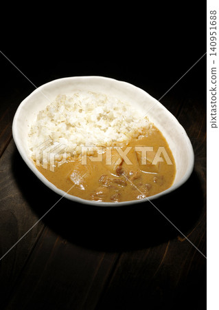 Barley rice and Massaman curry photographed separately. Barley rice and Massaman curry photographed separately. 140951688