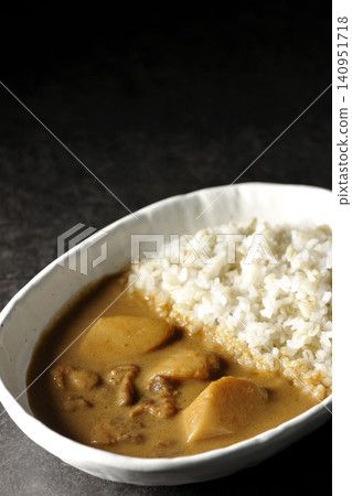 Barley rice and Massaman curry photographed separately. Barley rice and Massaman curry photographed separately. 140951718