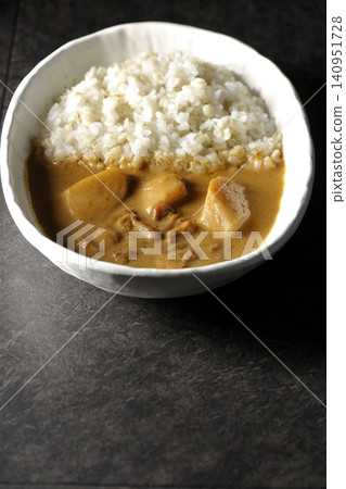 Barley rice and Massaman curry photographed separately. 140951728
