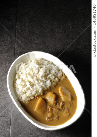 Barley rice and Massaman curry photographed separately. Barley rice and Massaman curry photographed separately. 140951740