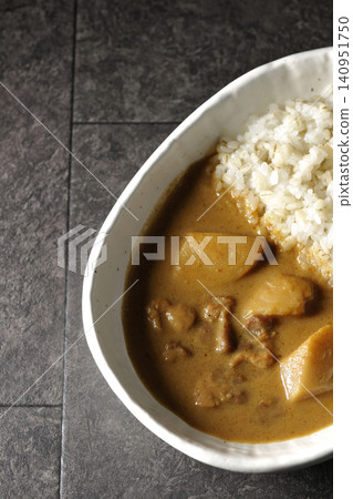Barley rice and Massaman curry photographed separately. Barley rice and Massaman curry photographed separately. 140951750