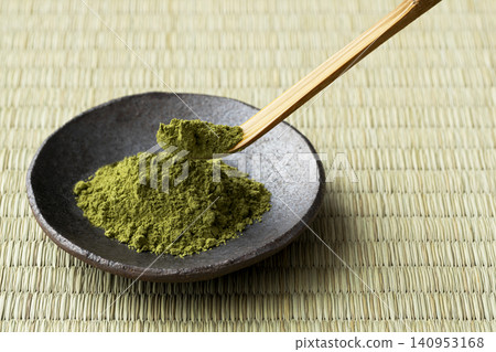 Matcha served on a black plate Matcha served on a black plate 140953168