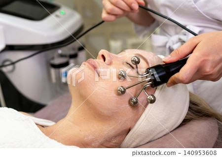 Microcurrent Eye Area Lifting Cosmetic Treatment Microcurrent Eye Area Lifting Cosmetic Treatment 140953608