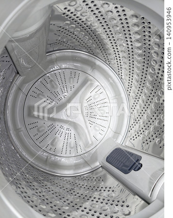Inside top load washing machine with empty drum Inside top load washing machine with empty drum 140953946