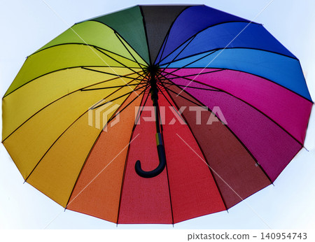 Looking Up at a Colorful Umbrella in Lisbon with a White Background Looking Up at a Colorful Umbrella in Lisbon with a White Background 140954743