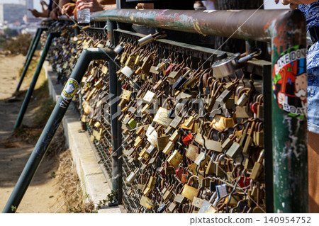Locks Placed on a Fence in Lisbon for Love and Memories 140954752