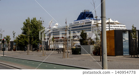 Lisbon Waterfront With Cruise Ship in the Background During Sunny Day Lisbon Waterfront With Cruise Ship in the Background During Sunny Day 140954778