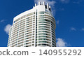 Apartment hotel building. Low angle view of building. Residential building architecture. Architectural exterior detail. Residential house modern exterior. Modern apartment building. Copy space 140955292