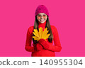 Stylish girl hold maple leaves. Fall season. Hello autumn. Carefree teen girl in hat and gloves isolated on pink. Autumn foliage. Autumn and leisure. Fall leaves and beautiful girl. Falling leaves 140955304