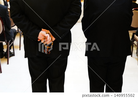 Mourners waiting to offer incense Mourners waiting to offer incense 140955502