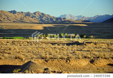 Iran, Iranian Plateau, Rocky mountains and qanat in the Kavir Desert Iran, Iranian Plateau, Rocky mountains and qanat in the Kavir Desert 140955566