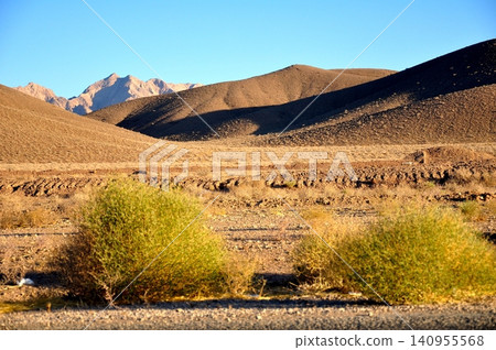 Iran, Iranian Plateau, Rocky mountains and qanat in the Kavir Desert Iran, Iranian Plateau, Rocky mountains and qanat in the Kavir Desert 140955568