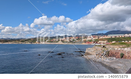 Panoramic view of the sea and colorful buildings lining the mountainside Panoramic view of the sea and colorful buildings lining the mountainside 140955879