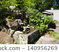 A water basin and bamboo ladle in a Japanese garden 140956269
