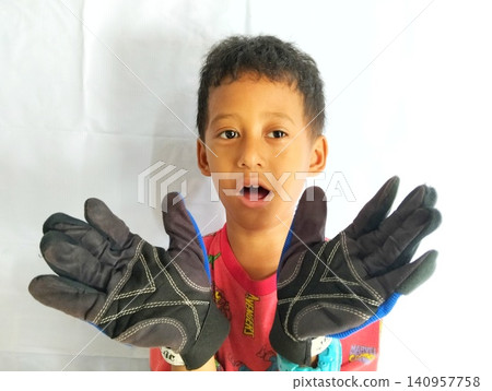 asian boy in chinese suit asian boy in chinese suit 140957758