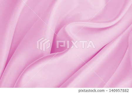Smooth elegant pink silk or satin texture as wedding background. Luxurious background design Smooth elegant pink silk or satin texture as wedding background. Luxurious background design 140957882