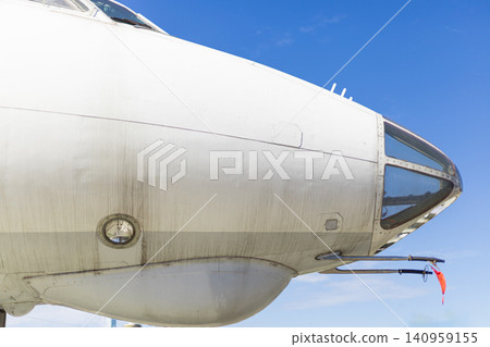 Close Up of Vintage Cargo Airplane Nose with Navigator Glass Cabin Close Up of Vintage Cargo Airplane Nose with Navigator Glass Cabin 140959155