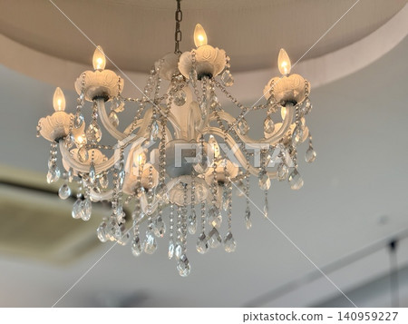 A luxurious yet somewhat cheap-looking chandelier A luxurious yet somewhat cheap-looking chandelier 140959227