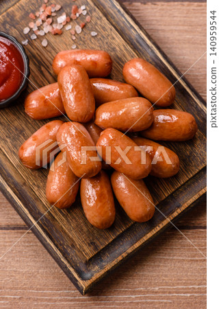 Chicken or pork grilling sausages with garlic, salt, and spices. Grilling sausages Chicken or pork grilling sausages with garlic, salt, and spices. Grilling sausages 140959544