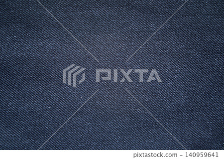 Close-up of blue denim fabric texture for jeans background and garment detail Close-up of blue denim fabric texture for jeans background and garment detail 140959641