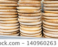 stacks of traditional galician wooden plates for serving octopus 140960263