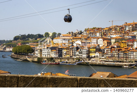 Scenic View of Porto Portugal With Cable Car Above the River Scenic View of Porto Portugal With Cable Car Above the River 140960277