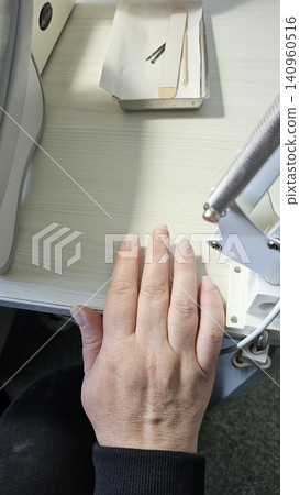 Natural nail recovery after damaged gel polish removal in professional manicure salon. renews weakened nails for healthy natural beauty. 140960516