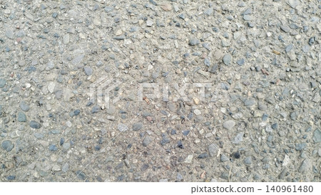 Asphalt Road Texture with Rough Gravel Stones Background Asphalt Road Texture with Rough Gravel Stones Background 140961480