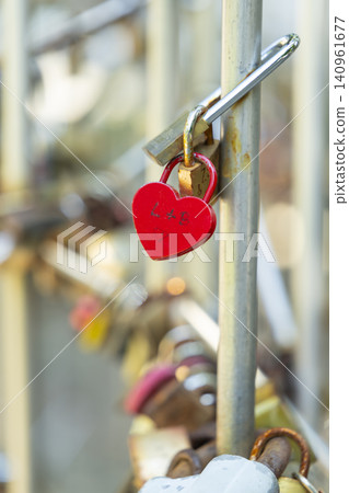 Red heart padlock symbolizing lasting love on Kaptalan Street, Pecs Red heart padlock symbolizing lasting love on Kaptalan Street, Pecs 140961677