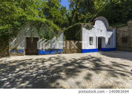 Traditional Petrov wine cellars with white walls and blue trim 140961694