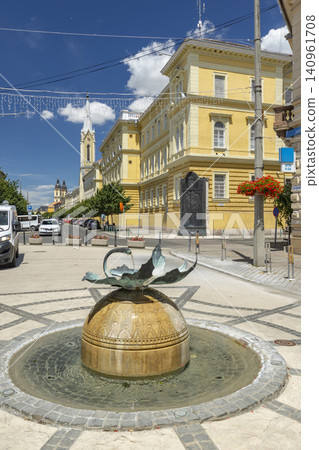 Kalocsa city center street with fountain and cathedral Kalocsa city center street with fountain and cathedral 140961708