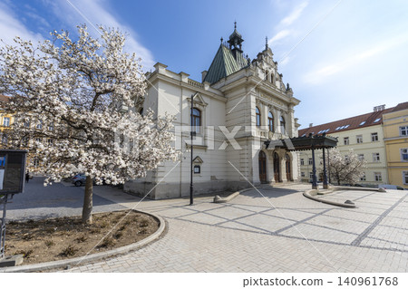 Mestske Divadlo Prostejov with blooming magnolia tree 140961768