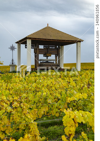 Traditional grape press in autumn vineyard Le Mesnil sur Oger Traditional grape press in autumn vineyard Le Mesnil sur Oger 140961856