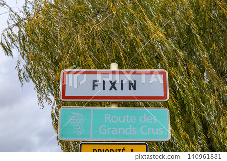 Fixin village sign on Route des Grands Crus Fixin village sign on Route des Grands Crus 140961881