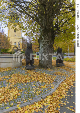Wooden bear statues standing in Primda namesti Republiky during autumn Wooden bear statues standing in Primda namesti Republiky during autumn 140961951