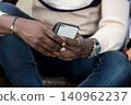 close up of young student with mobile phone. 140962237