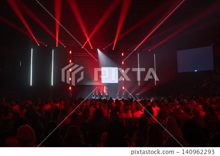Audience at motivational conference with dynamic lighting effects 140962293