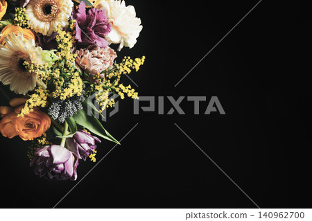 Beautiful bouquet of different flowers on black background, space for text. Floral card design with dark vintage effect 140962700