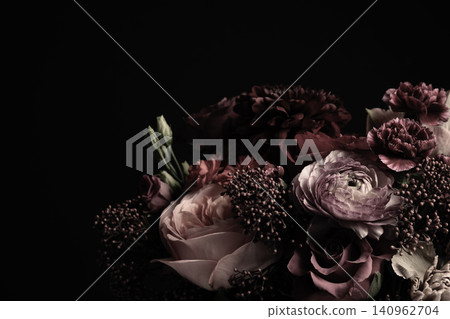 Beautiful bouquet of different flowers on black background. Floral card design with dark vintage effect Beautiful bouquet of different flowers on black background. Floral card design with dark vintage effect 140962704