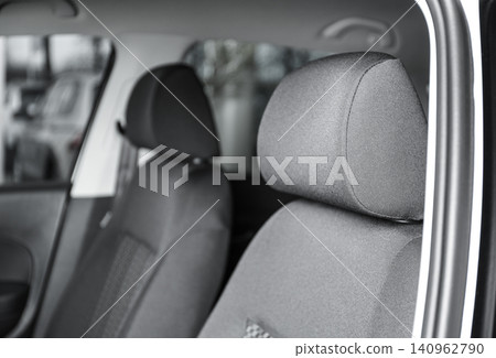 Modern car interior with comfortable grey seats Modern car interior with comfortable grey seats 140962790