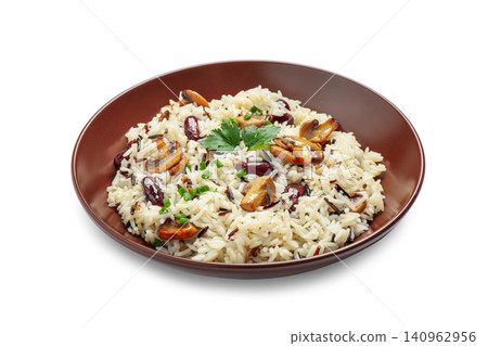 Delicious rice pilaf with mushrooms isolated on white Delicious rice pilaf with mushrooms isolated on white 140962956