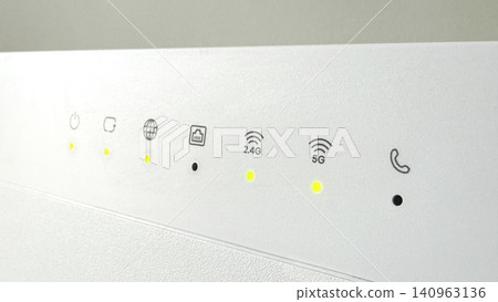 Modern WiFi Router with LED Indicators Showing Active Internet and Dual Band Wireless Network Modern WiFi Router with LED Indicators Showing Active Internet and Dual Band Wireless Network 140963136