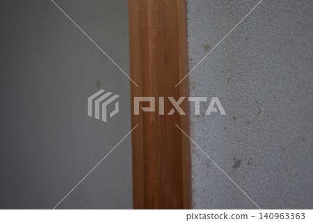 Mold stains are appearing on the mud walls of an old house. This is due to humidity issues and deterioration of building materials. Mold stains are appearing on the mud walls of an old house. This is due to humidity issues and deterioration of building materials. 140963363