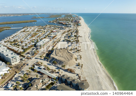 Hurricane Milton aftermath cleanup. Sand piles at Englewood Beach on Manasota Key. Sand recipient site after storm surge Hurricane Milton aftermath cleanup. Sand piles at Englewood Beach on Manasota Key. Sand recipient site after storm surge 140964464