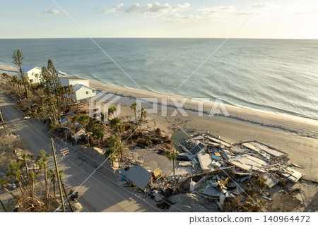 Destroyed houses on ocean coast. Hurricane Milton consequences in Englewood, Florida. Storm surge severe damage Destroyed houses on ocean coast. Hurricane Milton consequences in Englewood, Florida. Storm surge severe damage 140964472