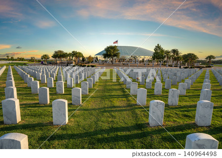 American national military cemetery with rows of white tomb stones on green grass lawn. Memorial Day concept American national military cemetery with rows of white tomb stones on green grass lawn. Memorial Day concept 140964498
