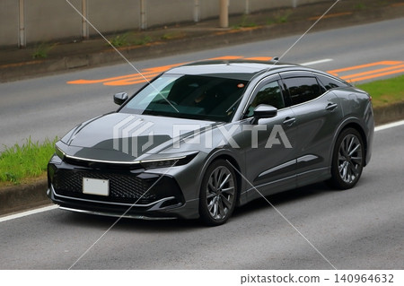 Image of a Japanese sedan in motion Image of a Japanese sedan in motion 140964632